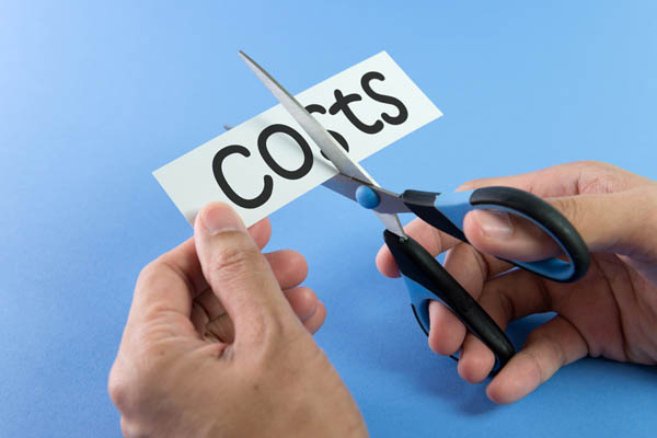 image of scissors cutting costs depicting low heating costs
