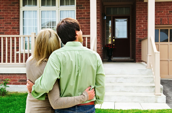 image of a couple buying a house that uses heating oil