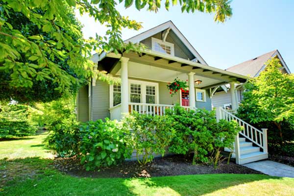 image of a home in summer that uses heating oil